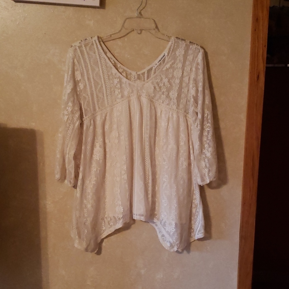 Cream colored lace blouse
